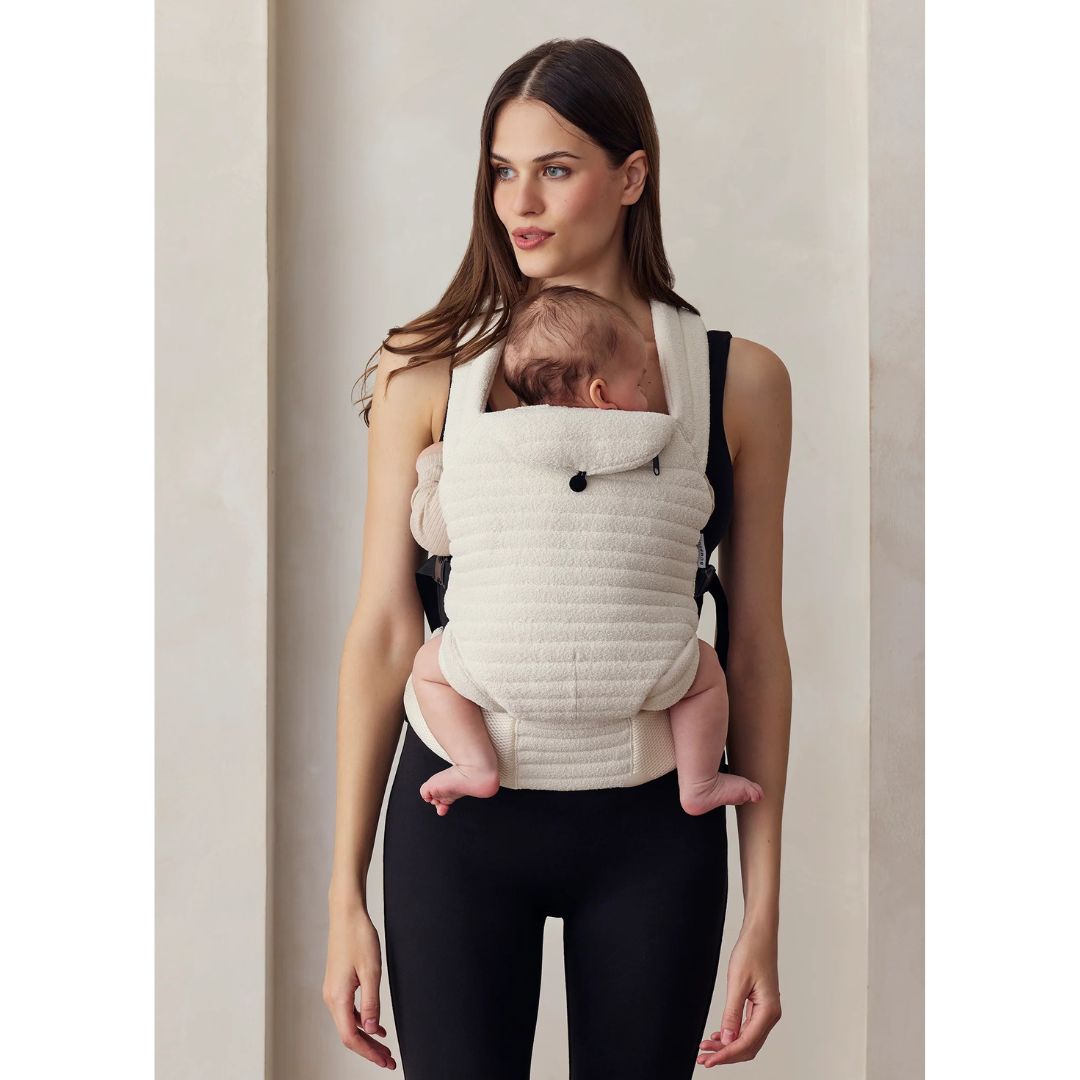 Model wearing Bumpsuit Baby Carrier in Cloud