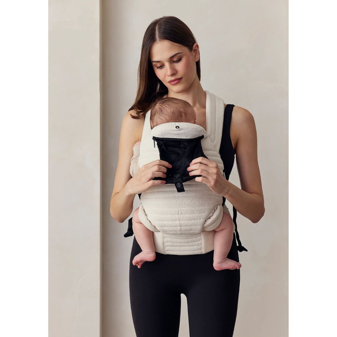 Baby in Bumpsuit Armadillo Baby Carrier