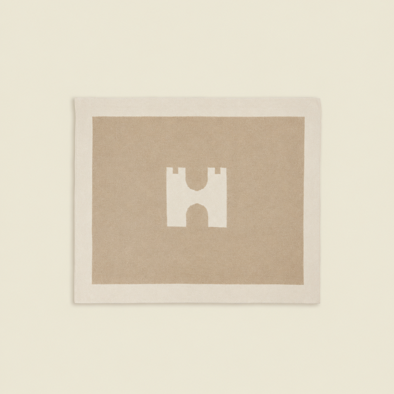 Framed artwork with a geometric design on a beige background