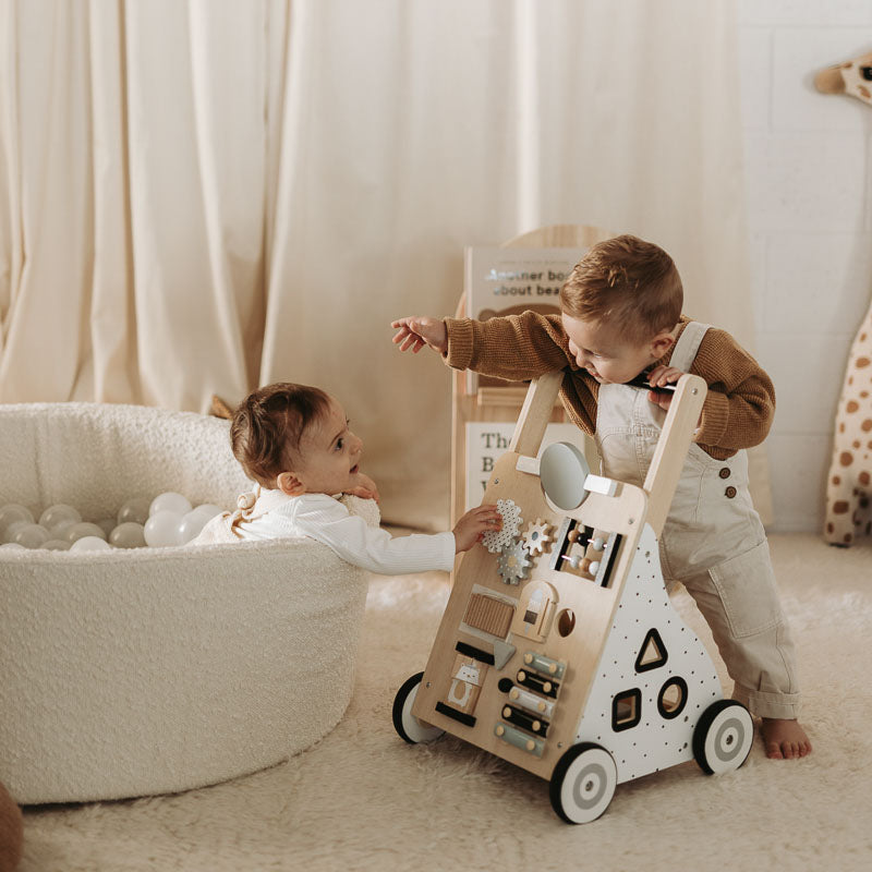 Nuage Interior - Babies playing in ball pit and with baby walker