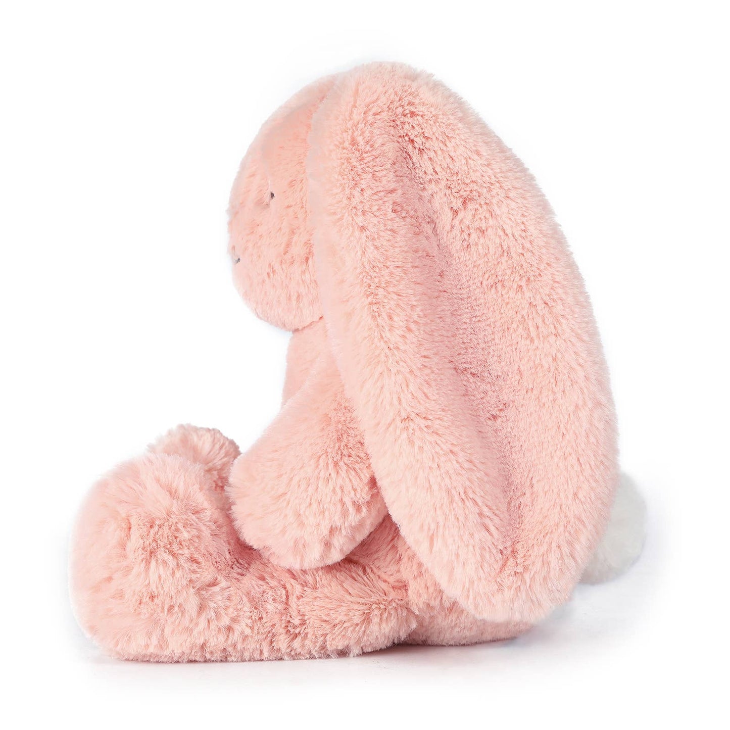 Pink plush toy on a white background side view