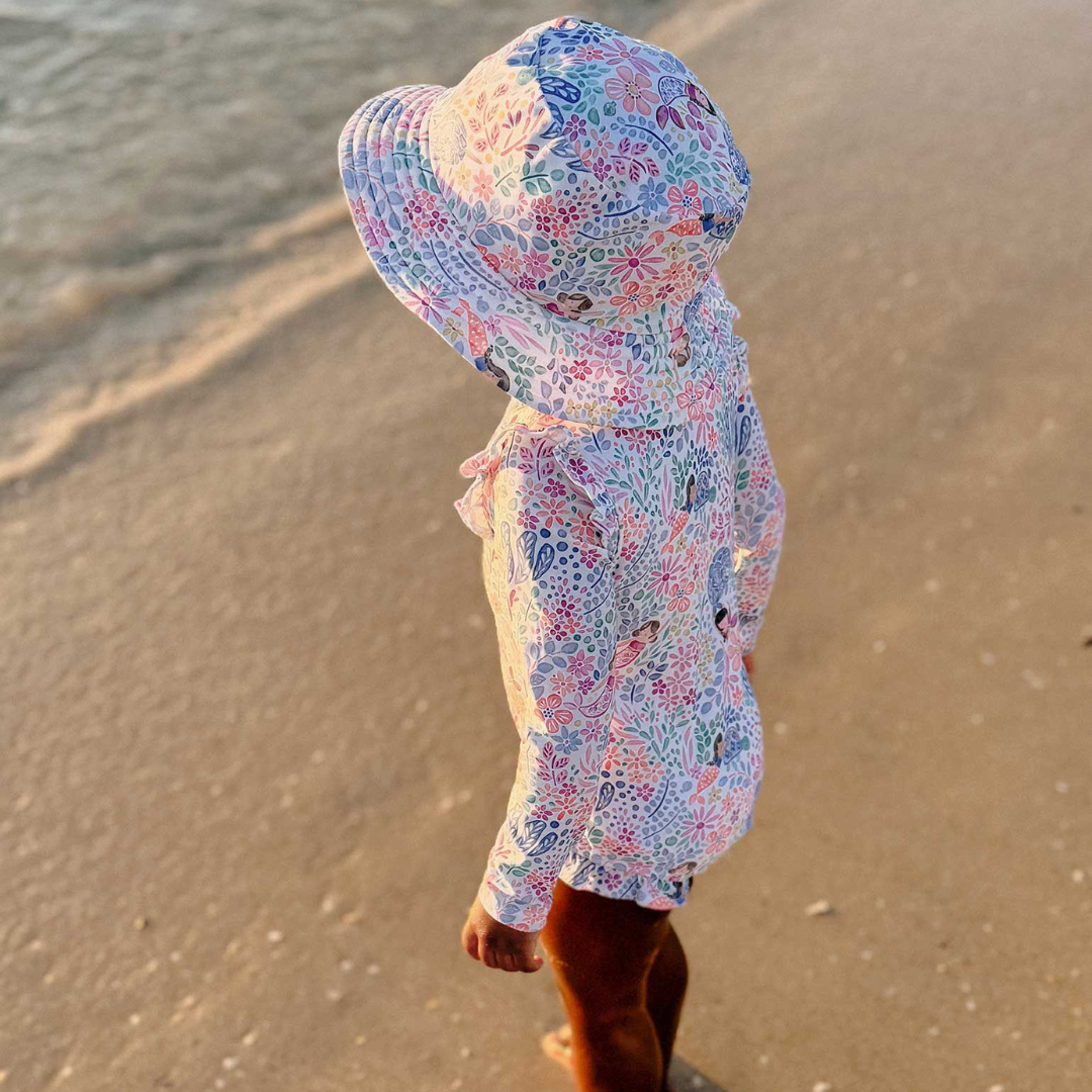 Pure Baby - Girl at the beach with mermaid swimmers and matching broad brim hat