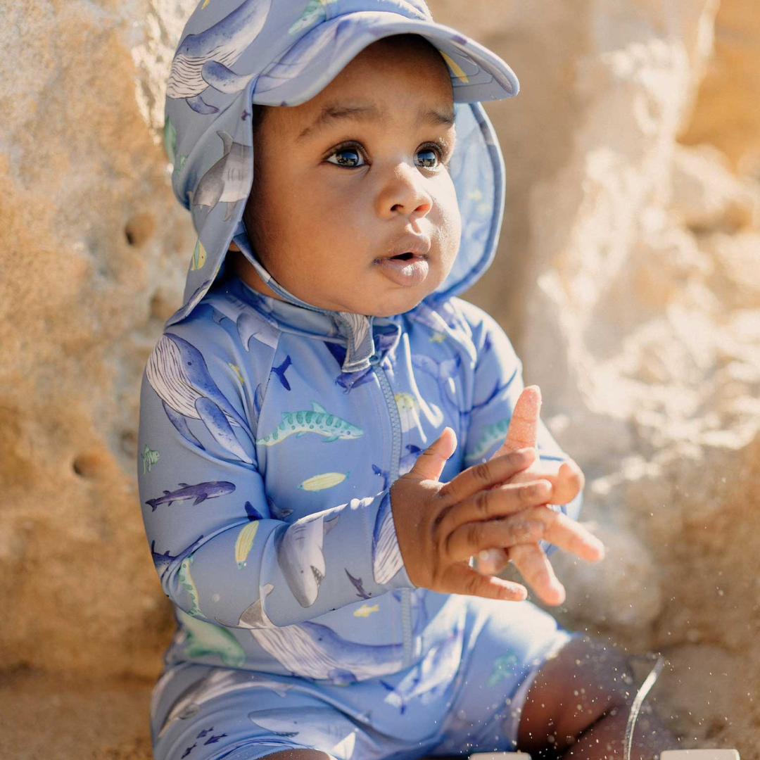 Pure Baby - Baby at the beach with swimmers and matching shark swim hat