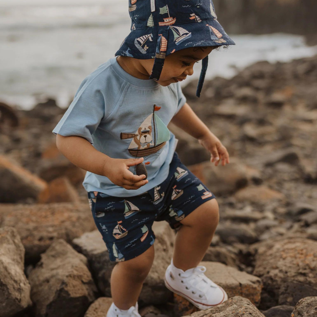 Pure Baby - Toddler at the beach wearing pure baby outfit